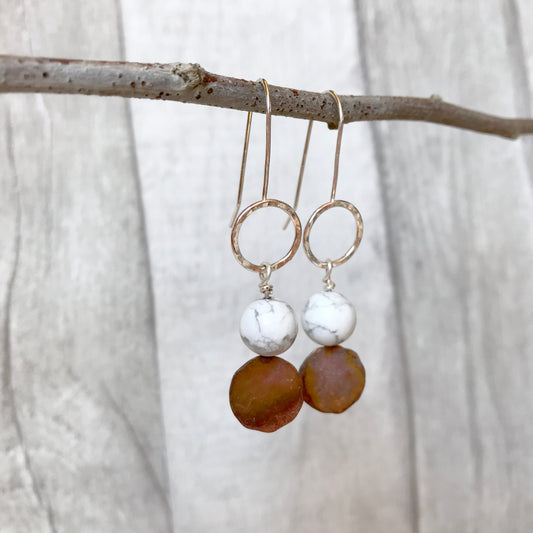 Hammered silver circles with white marbled with grey Howlite stones and coloured copper disk on fixed silver earring hooks, by zoe ruth designs