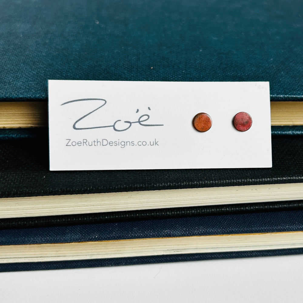 Handmade sterling silver stud earrings displayed on their logo card packaging of Zoe Ruth Designs