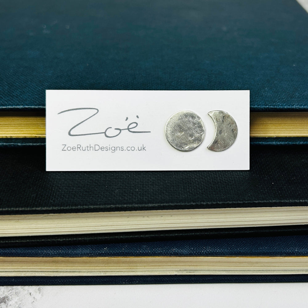 Handmade sterling silver stud earrings displayed on their logo card packaging of Zoe Ruth Designs