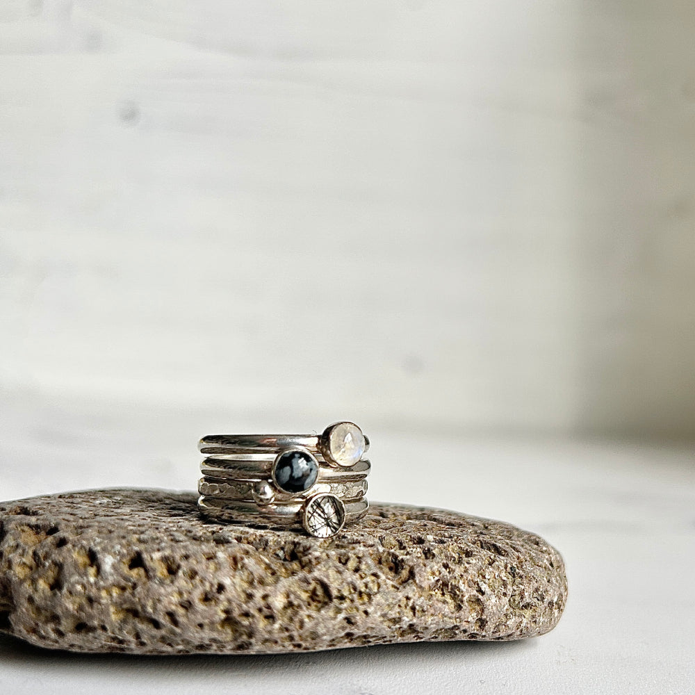 Stack of four rings - Snowflake Obsidian, Moonstone, Tourmalinated Quartz