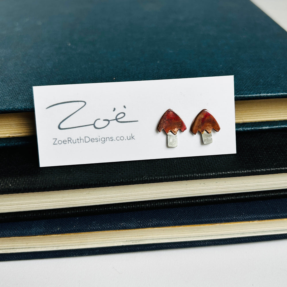 Handmade sterling silver stud earrings displayed on their logo card packaging of Zoe Ruth Designs