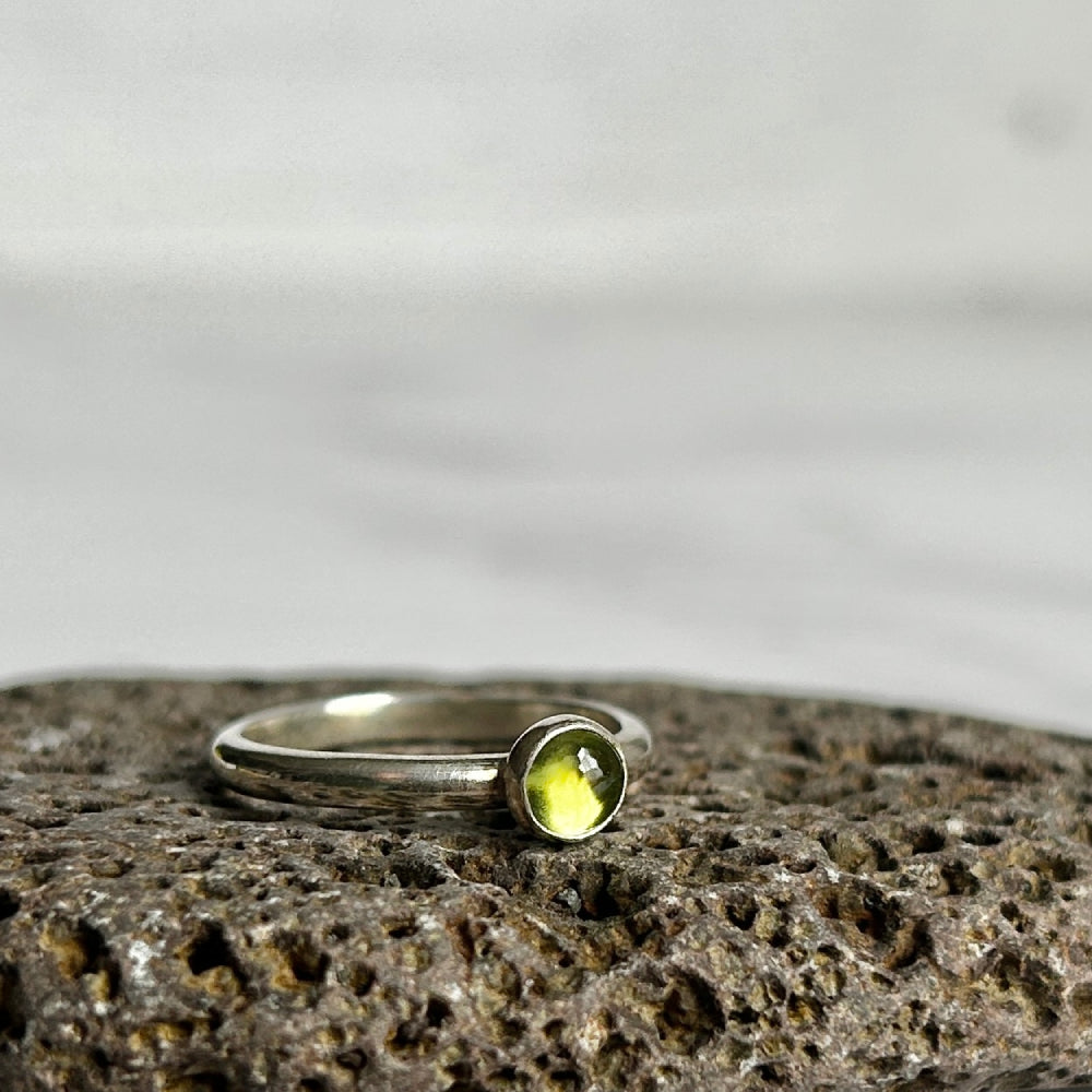 Peridot single stone ring