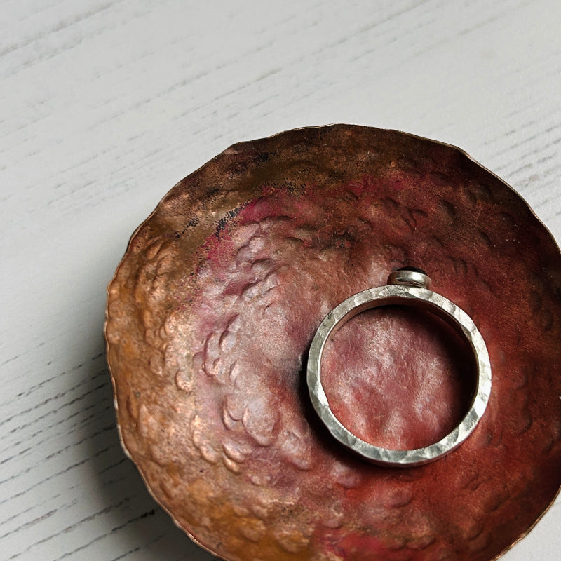 birdseye view of a hammered edge silver ring