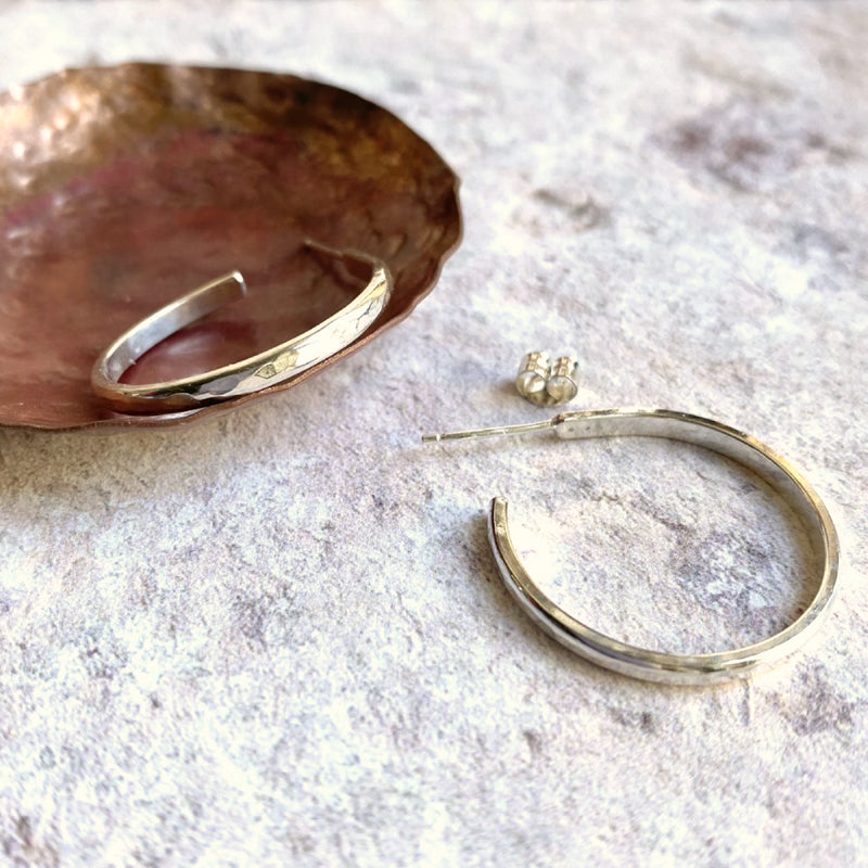 Dimple textured silver hoop studs