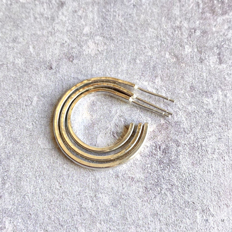 Dimple textured silver hoop studs