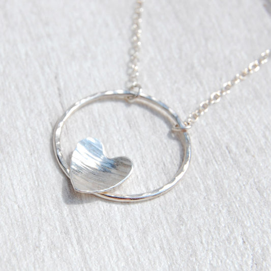 Silver heart on silver circle necklace
