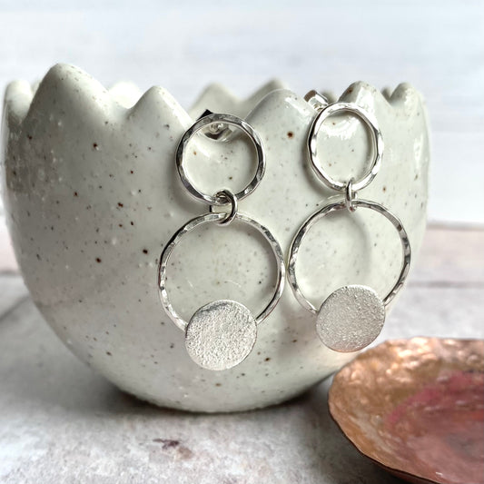 Silver circles dangle stud earring