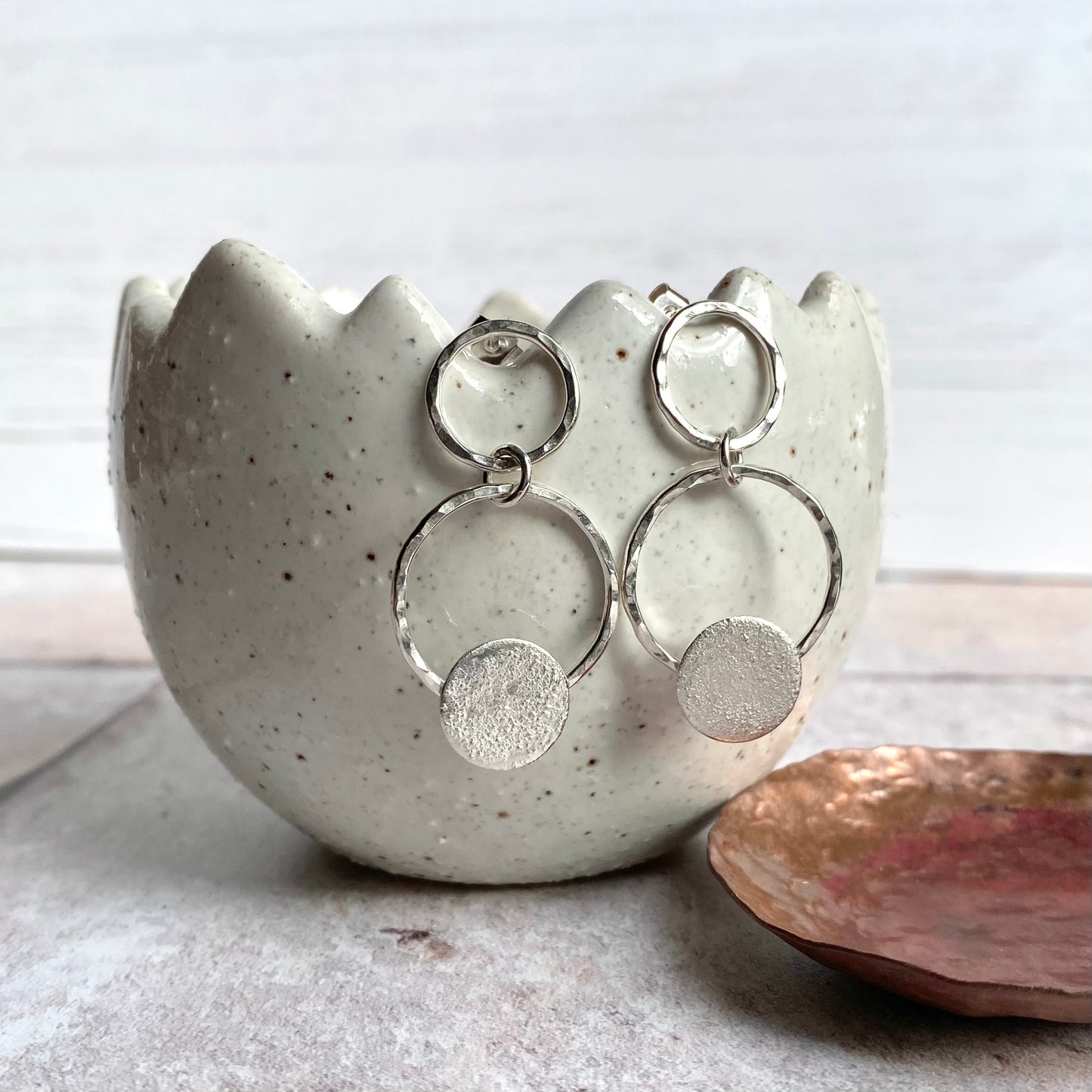 Silver circles dangle stud earring
