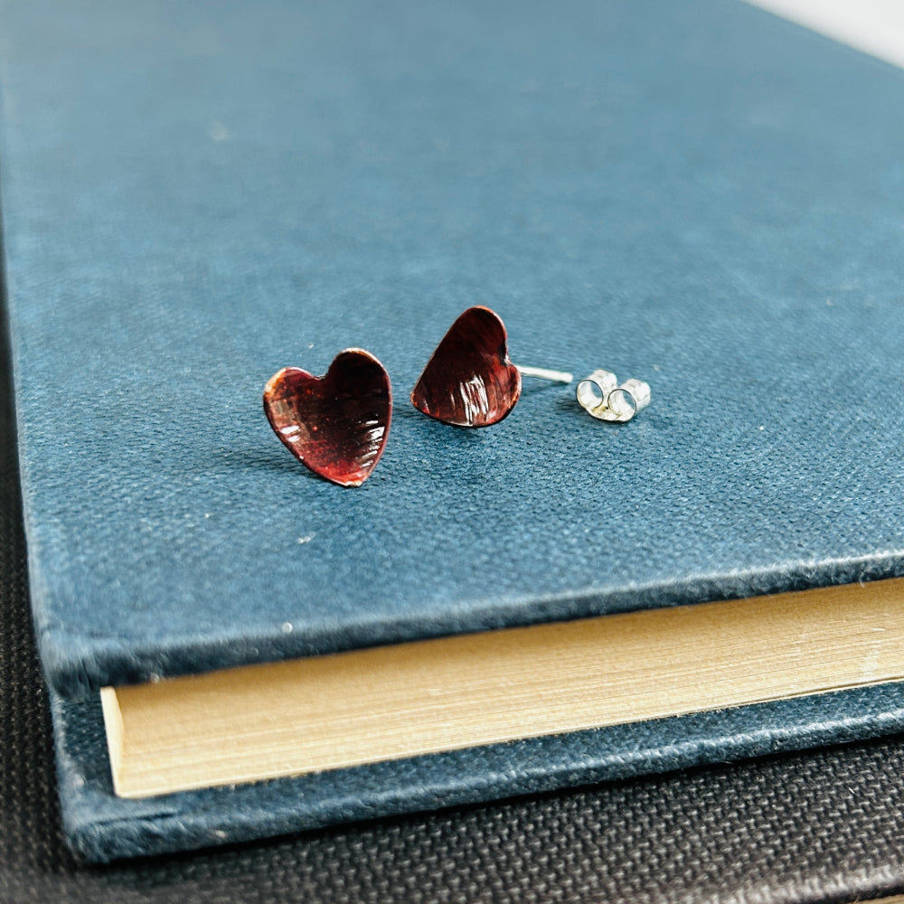 Heat coloured copper heart studs