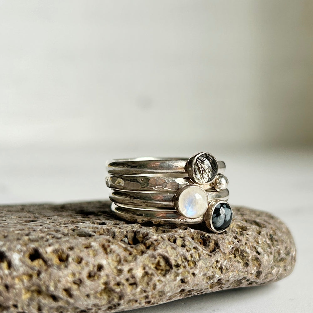 Stack of four rings - Snowflake Obsidian, Moonstone, Tourmalinated Quartz