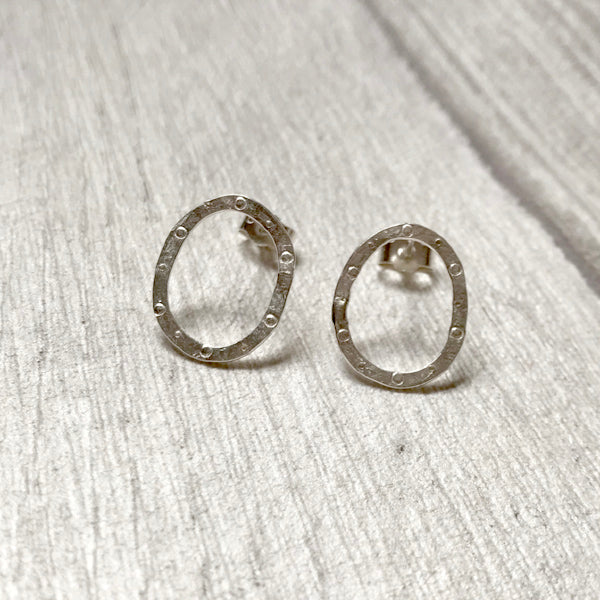 Silver circle and dot oval studs
