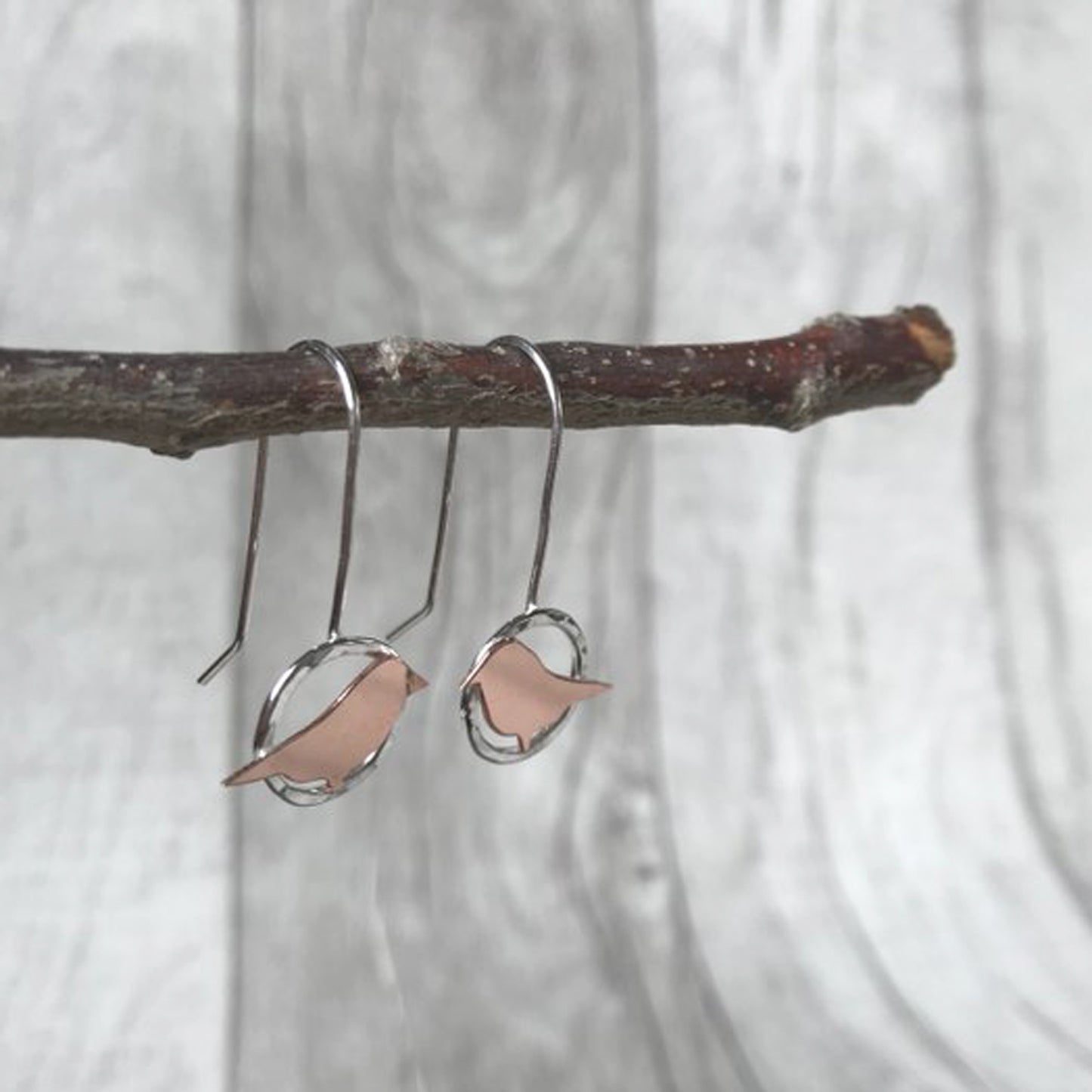 Copper bird on silver circle drop earrings