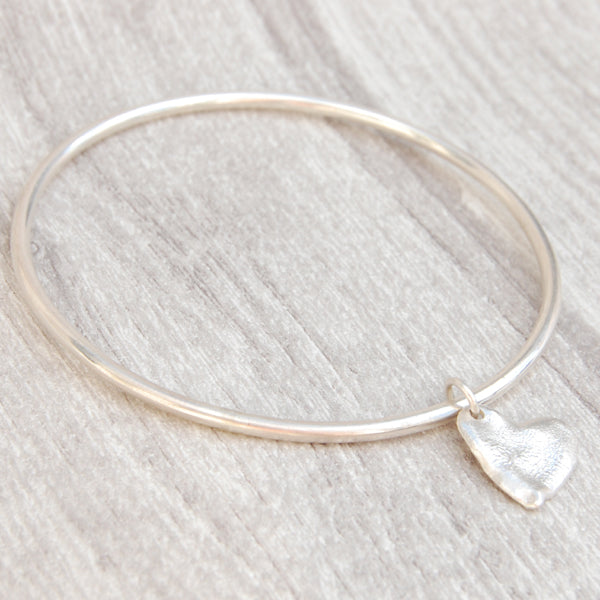 Melted silver heart charm bangle
