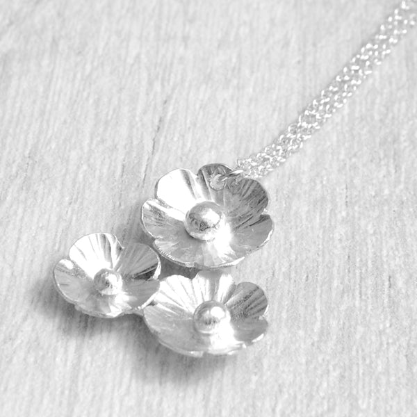 Silver flower cluster necklace