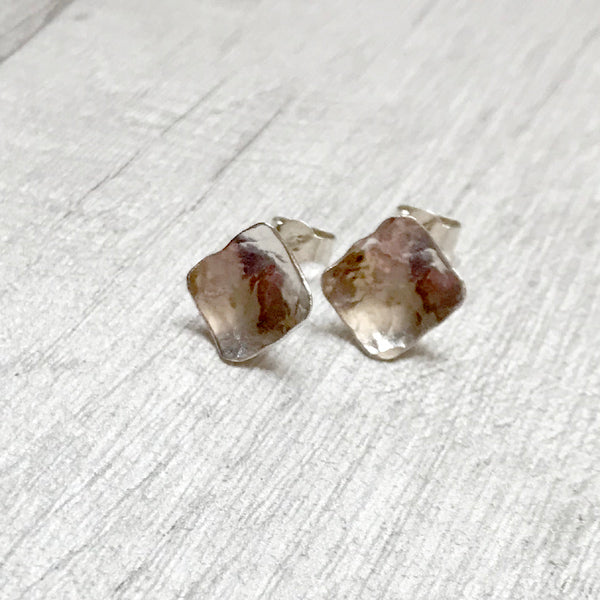 Silver diamond shaped stud earrings