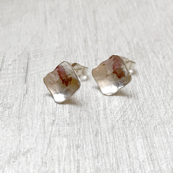Silver diamond shaped stud earrings