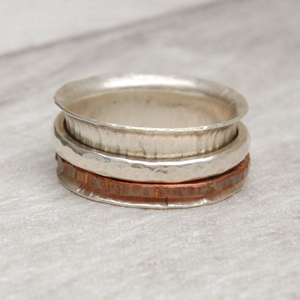 Spinner ring with copper and silver textured rings