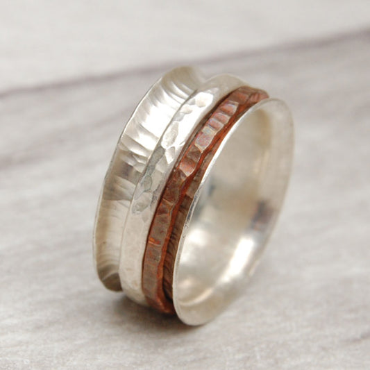 Spinner ring with copper and silver textured rings