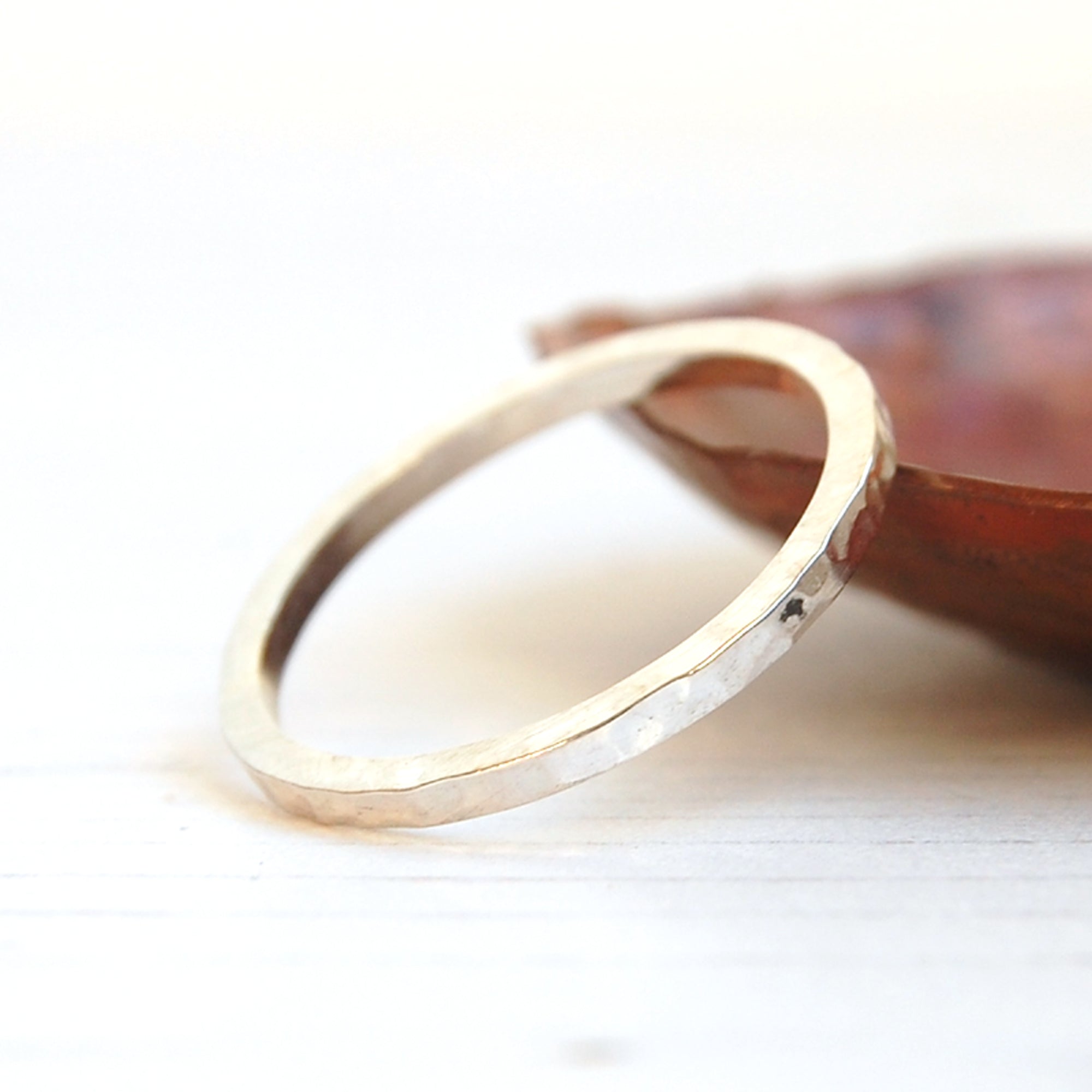 Hammered texture clearance ring