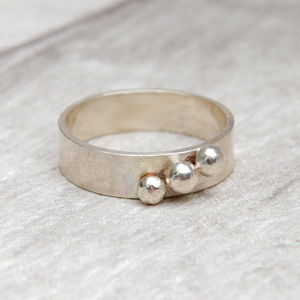 Three small pebbles silver ring