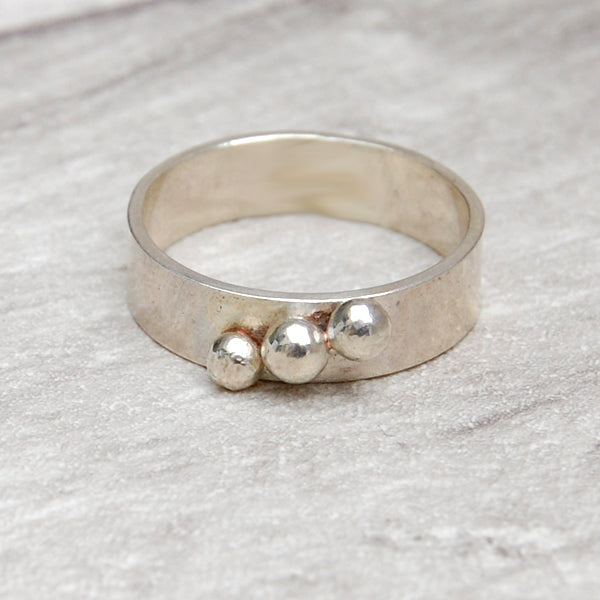 Three small pebbles silver ring