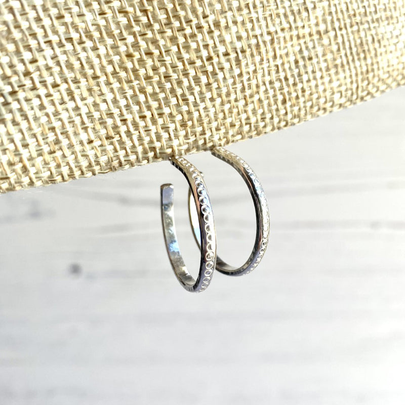 sterling silver hoop stud earrings with circle texture by zoe ruth designs